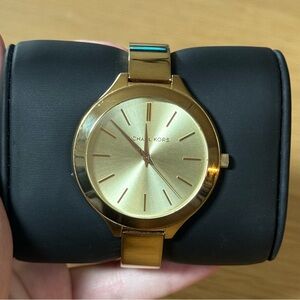 Michael Kors gold women’s watch